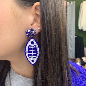 Blue and white football earrings